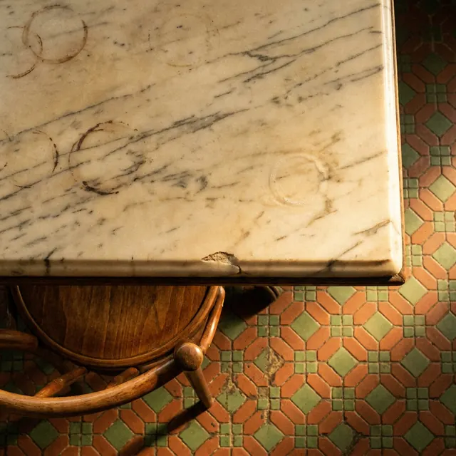 [object Object] — Marble tabletop, mosaic floor, morning light.